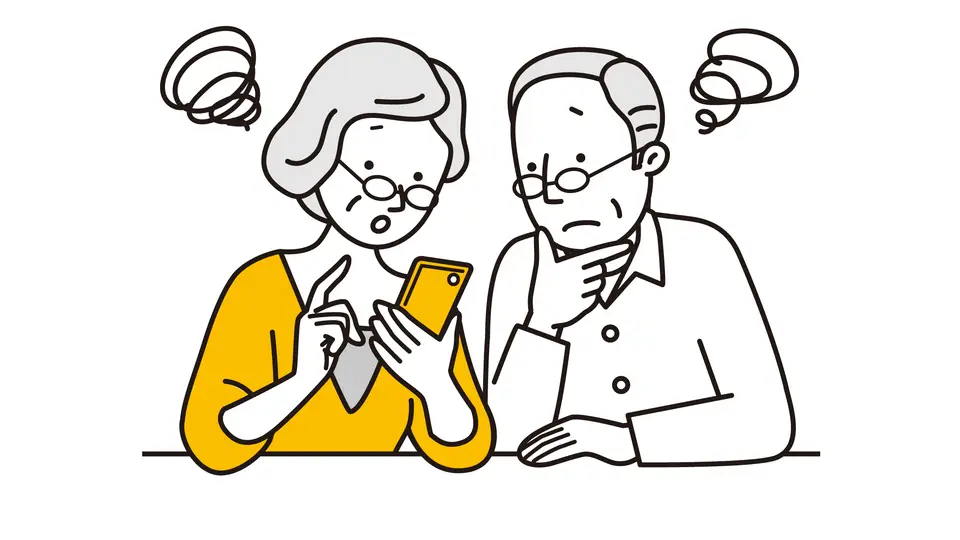 スマホで悩むシニア夫婦