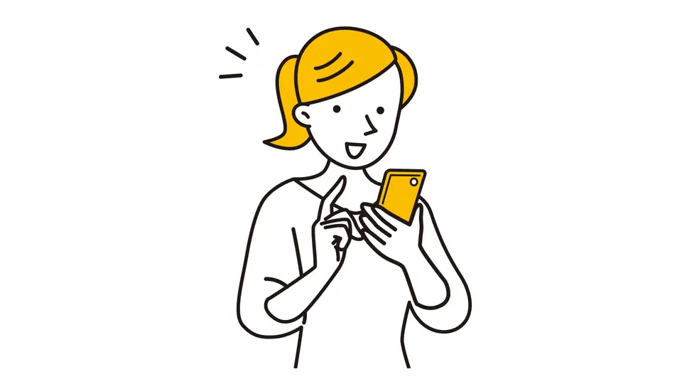 スマホの画面を見て喜ぶ女性