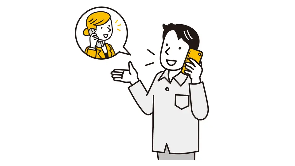 電話をかけて会話する男性