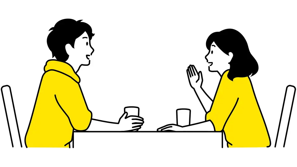 向き合って話す男女 休憩 お茶する 座る